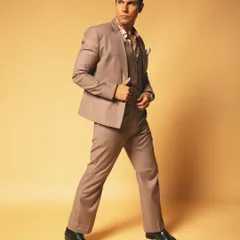 A full-length shot showcasing the complete styling for Randeep Hooda's classic suit. This demonstrates how we build a complete character look for a celebrity photoshoot.