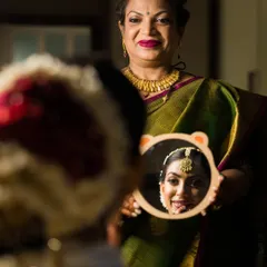 A creative and heartwarming portrait of Aashna and her mother, seen through a reflection. A beautiful tribute to the mother-daughter bond.