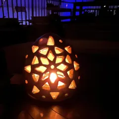 The magical glow of a handmade ceramic tea light holder. The light and shadows create such a peaceful and festive vibe.