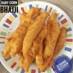 Crispy Baby Corn Bhajji, a delicious twist on the classic bhajji. The sweet baby corn pairs wonderfully with the savory, spiced batter, making it an irresistible snack.