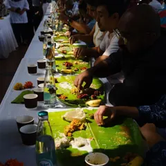 There is nothing like the energy of a community feast. This was from a spectacular Onam Sadhya I catered, where over 200 people came together to enjoy a traditional meal served on banana leaves. I can bring this experience to your large-scale events too.