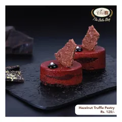 The Hazelnut Truffle Pastry is a mini version of our popular cake. It's a rich, decadent, and elegant individual dessert.