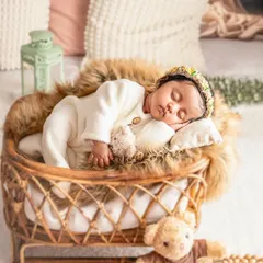 Like a dream. This cozy wicker bassinet is one of my favorite props for creating a warm, rustic, and sleepy atmosphere.