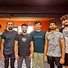 A group photo of Team Ippon members after competing in an in-house grappling tournament. These events build skill and strengthen our community.