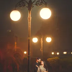 Under the soft glow of city lights, we create pure magic. This night portrait showcases my expertise in using ambient light to craft a moody, romantic, and unforgettable scene for your pre-wedding shoot.