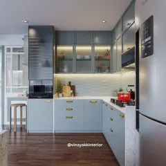 A modern kitchen should be as beautiful as it is functional. For this project, I chose calming powder-blue cabinets with sleek gold handles for a contemporary look. Features like fluted glass shutters and under-cabinet lighting add both style and practicality, making everyday cooking a pleasure.