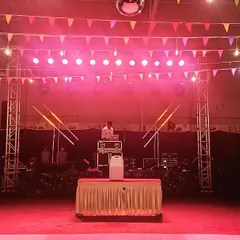 Getting the party started with a professional DJ stage and lighting rig. Our indoor hall is equipped to handle the technical needs of any high-energy event.