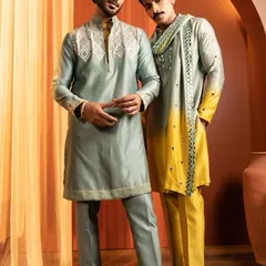 Another look from the Kaaj Button campaign, showcasing grooming on two models. Each look is tailored to the individual's features while maintaining a cohesive, clean aesthetic for the brand.
