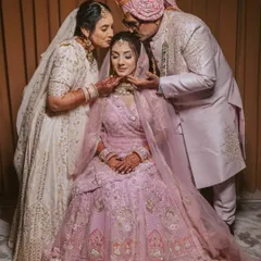 A tender moment of love and blessings from the parents. These are the candid family portraits we cherish, capturing the deep emotional bonds that are at the core of every wedding celebration.