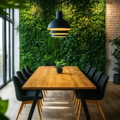 Meetings are better with a view. A full-height artificial green wall brings the calming effect of nature into this corporate dining room, fostering a more relaxed and creative environment.