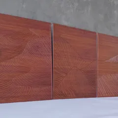 Our minimalist wood wall art triptych in a rich brown finish. The continuous carved lines flow across the three panels to create a serene, abstract mountain landscape.