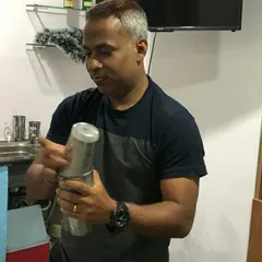 In my element, shaking up a cocktail. Every shake has a purpose, to chill, dilute, and aerate the drink to perfection.