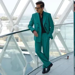 Another look for Anil Kapoor during the IIFA weekend. This style is confident and relaxed, complementing his bold green suit.
