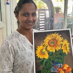 This student is all smiles with her beautiful still life painting of sunflowers. Our adult acrylic classes guide you from initial sketch to a finished, frame-worthy artwork.