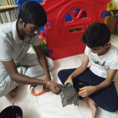 Here, we are building a tonoscope, a device that makes sound waves visible. It's a fascinating project that connects vibrations to the patterns we can see.