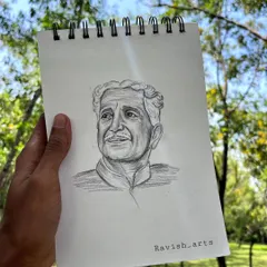 A photo of the finished Kuvempu sketch, a tribute to the literary giant.