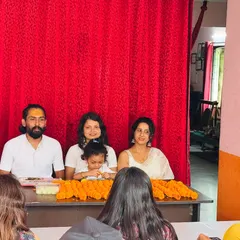My family and I sit before the students at the closing ceremony. Our school is a family, and we share these important moments with our students.