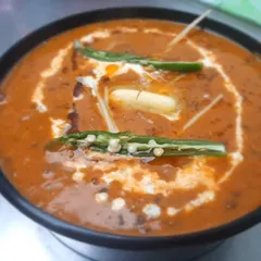 Our Dal Makhan Wali, also known as Dal Makhani, is rich, creamy, and topped with butter. It's the perfect comfort food for any meal.