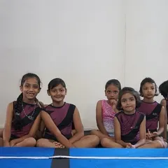 A group of our Level 1 gymnasts taking a break during their certification event. We love seeing them support each other.