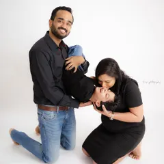 Pure family fun. I love capturing these candid moments of laughter and play during a maternity session. It’s all about celebrating the love you share as your family grows.