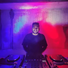 The DJ booth is my command center. From here, I mix Hip Hop, House, and Techno to build the energy and keep the party going strong.