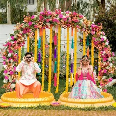 A playful shot from the same Haldi ceremony, with the couple making funny faces for the camera.