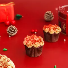 My Red Velvet cupcakes, ready for the Christmas season. The rich red cake and white cream cheese frosting are naturally festive.