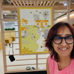 A happy selfie with my work at the Amazon office. Creating art that will be seen by hundreds of people every day is a huge honor.
