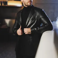 For this autumn winter campaign, I styled a classic black leather blazer over a turtleneck. It's a timeless combination that exudes confidence and is perfect for an evening of sophisticated style.