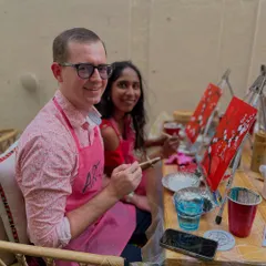 A couple enjoying a creative date at one of my cafe workshops. Painting together is a wonderful way to connect and create a shared memory.