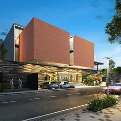 A night-time rendering of a luxury clubhouse for a 7.1-acre residential community in Bengaluru. The design uses a powerful combination of brick cladding, textured stone, and warm ambient lighting to create a grand and welcoming entrance.