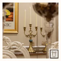 This classic metal candelabra, with its vintage charm and intricate curves, is perfect for creating an elegant atmosphere. It adds a timeless touch to a sideboard or dining table.