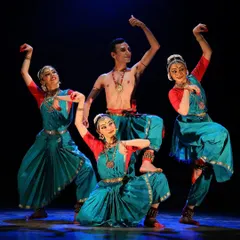A powerful tableau from 'Tyāgarāja Hṛt Sadana', showcasing the dynamic group formations that are a hallmark of my ensemble choreography. The interplay between dancers creates a rich visual narrative.