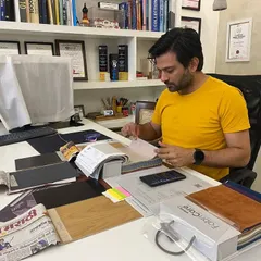 A candid shot of me in work mode. Loving what you do means that even a desk full of paperwork and samples feels like a creative playground.