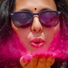 A classic Holi moment, blowing colorful gulal. I help create these picture-perfect, fun-filled memories at every Holi party I choreograph.