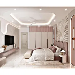 This bedroom combines soft pink and white tones for a gentle and romantic feel. We designed a custom floor-to-ceiling wardrobe and a feature wall with decorative molding and a unique headboard to create a cohesive and elegant look.