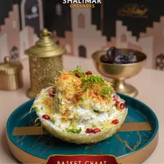 The celebratory Basket Chaat is a popular item on our festive menus, offering a delightful mix of textures and flavors in a crispy, edible bowl.