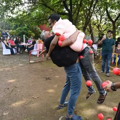 A hilarious moment from one of our custom-designed outdoor games. My goal is to create activities that are not only about teamwork but also about creating funny, shareable memories for the employees.