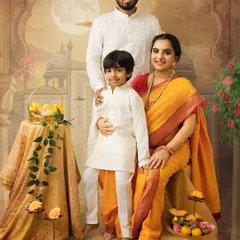 A beautiful family portrait celebrating the arrival of a new member. This painterly style, inspired by traditional Indian art, captures the warmth and love between parents and their soon-to-be older son.