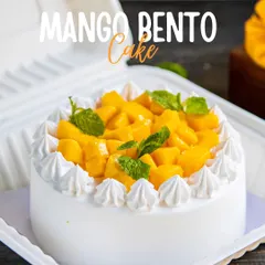 Mango madness in a cute little box! Our mango bento cake is loaded with fresh mango chunks and is the perfect single-serving treat.