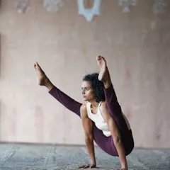 Growth is uncomfortable, but it doesn't have to be a giant leap. Taking one small step forward is where momentum begins. Here, I am practicing an arm balance that requires both strength and focus, embodying that first step.