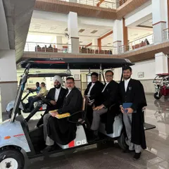 Utilizing the unique golf cart service for lawyers at the Jharkhand High Court. It is a thoughtful facility that adds to the convenience of navigating India's largest court complex.