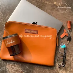This is a perfect example of a premium employee welcome kit. The set includes a personalized laptop sleeve, a custom-engraved sipper, and a matching keychain, all designed to create a cohesive and impressive brand experience from day one.