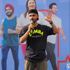 Guiding the participants through a warm-up routine at the Narayana Health event. We make sure our instructions are clear and the energy is high from start to finish.