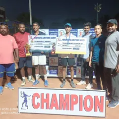 The coaching team stands with the winner and runner up of a recent prize money championship. We believe in celebrating these victories as a team, acknowledging the hard work from both the players and their mentors.