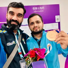 Another one of our shooters with his Bronze medal. We work closely with each athlete to build their mental and technical skills for high-pressure competitions.