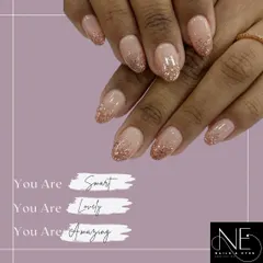 A classic and popular choice, this glitter fade uses a warm rose gold glitter over a natural pink base. It's an elegant look that's perfect for any event.