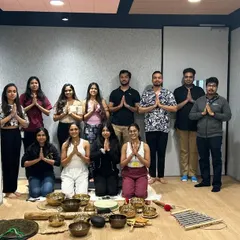 A team photo after a successful corporate mindfulness workshop. It's wonderful to see colleagues come together to prioritize their mental and emotional health as a group.