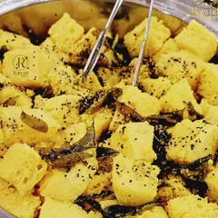 Another look at my delicious Khaman Dhokla, a popular snack and side dish for any occasion. I ensure it is always light, fluffy, and full of flavor.
