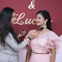 Another behind-the-scenes moment, capturing the process of creating a flawless base for a photoshoot.